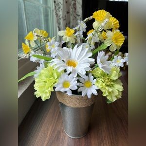 Faux flowers in farm house tin vase
